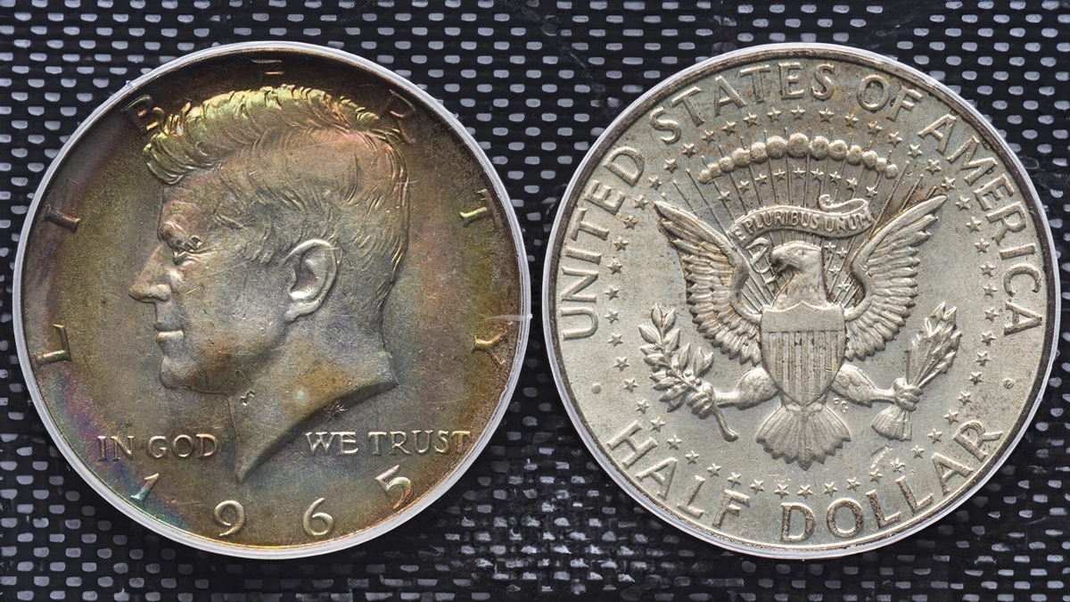 1965 Kennedy half dollar coins group shot including business strike and Special Mint Set examples showing range of conditions